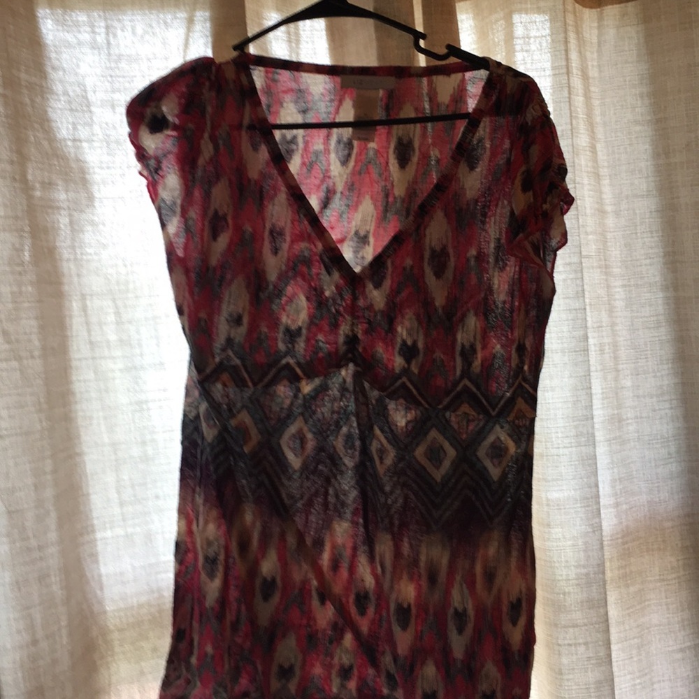 Multi colored pink egg eggplant and beige  shirt